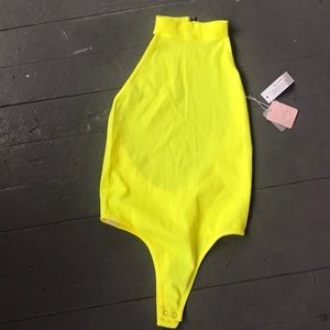 Neon yellow body suit
